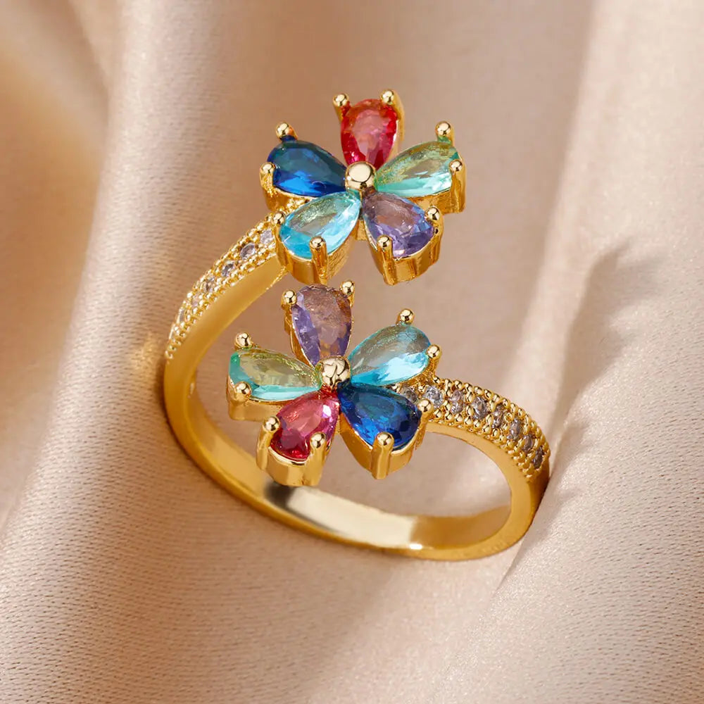 Anillo de doble flor con circonitas de colores para mujer