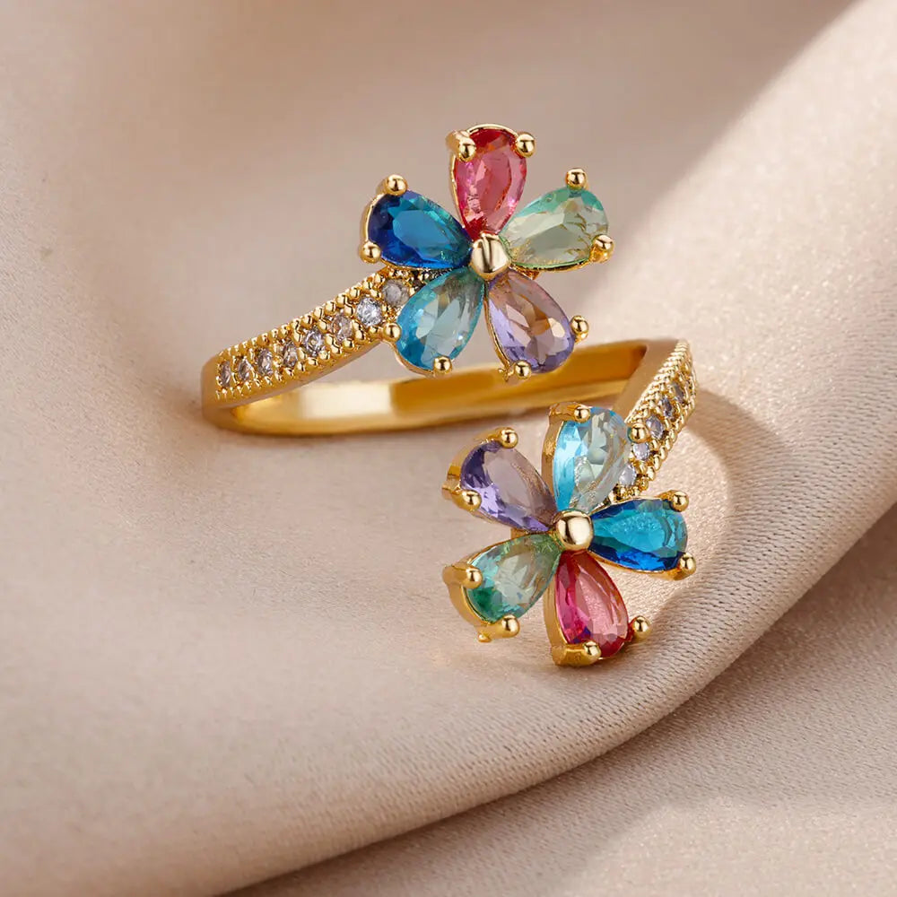 Anillo de doble flor con circonitas de colores para mujer