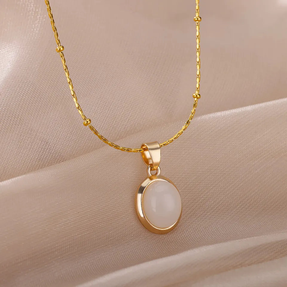 Elegante cadena dorada o plateada con dije a elegir con circonias para dama y caballero