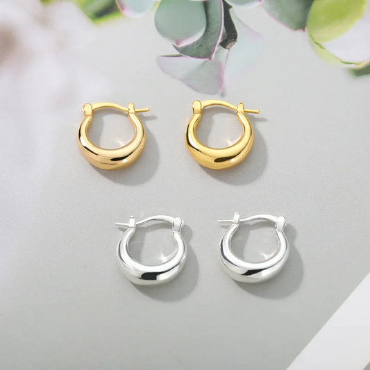 Pendientes minimalistas redondos de acero inoxidable para mujer