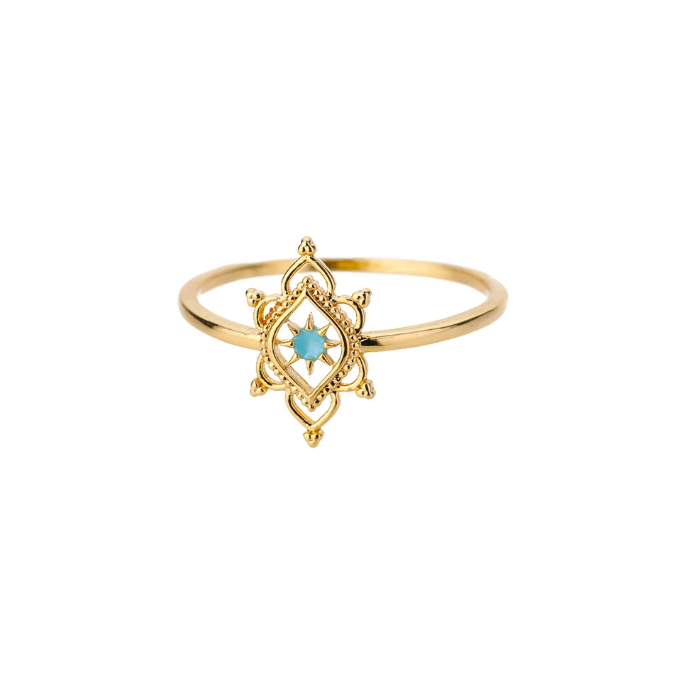 Anillo de acero inoxidable dorado con flor de estrella y ópalo