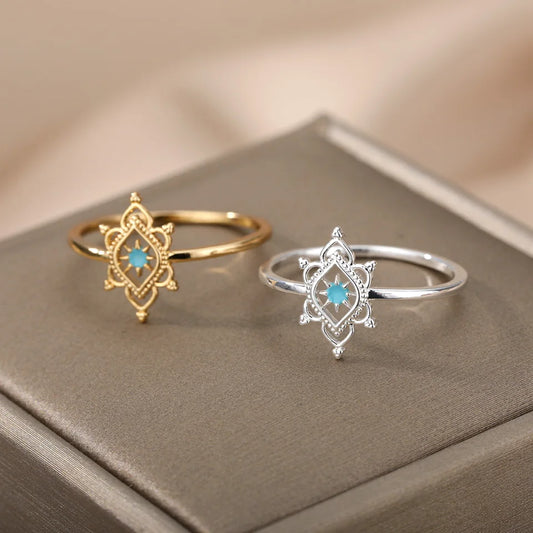 Anillo de acero inoxidable dorado con flor de estrella y ópalo