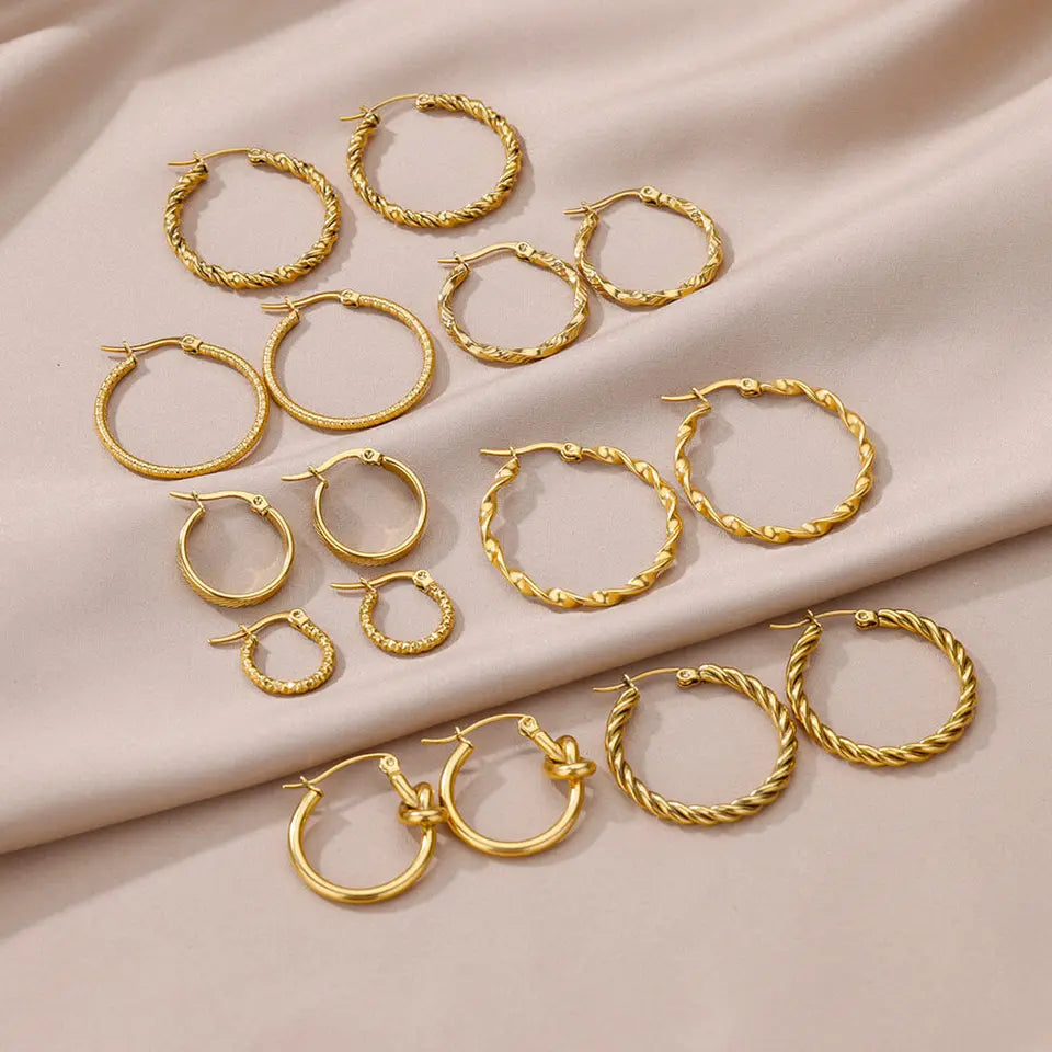 Elegantes arracadas de acero inoxidable en tendencia minimalista y vintage