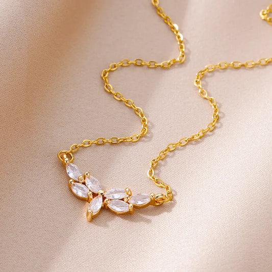 Collar con colgante de gota de agua y circonita dorada para mujer