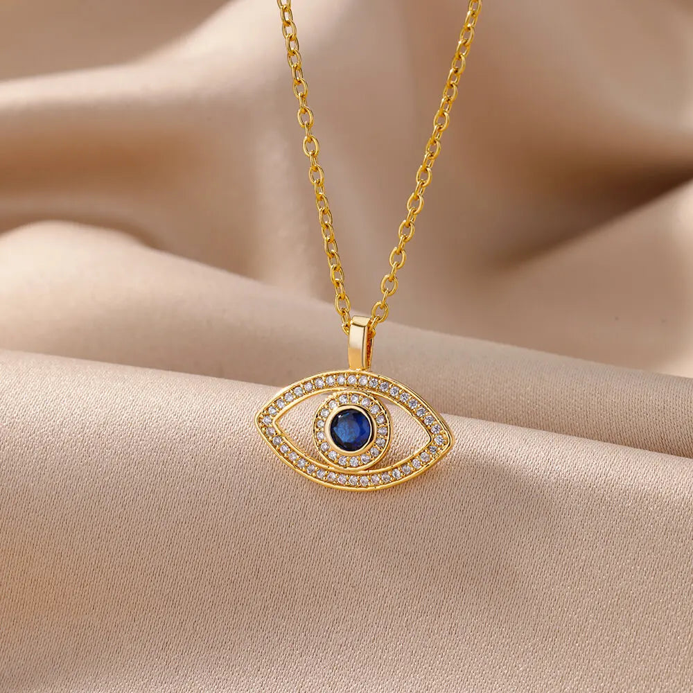Collar con colgante de ojo malvado de circonita dorada para mujer