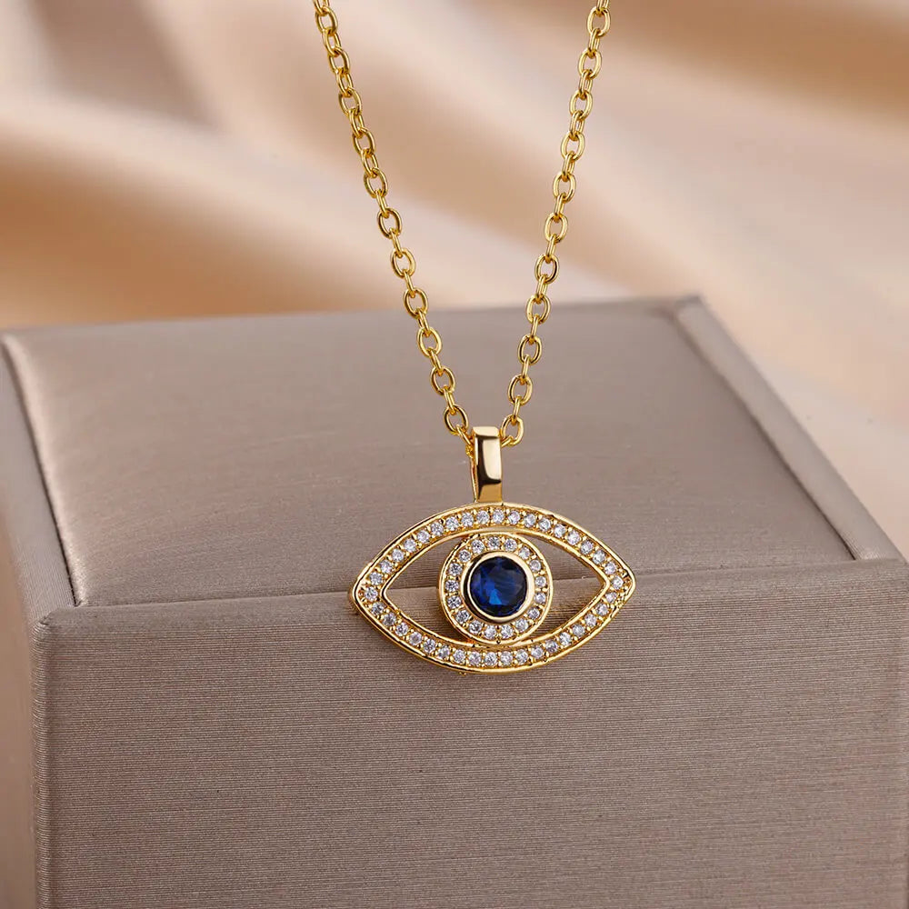 Collar con colgante de ojo malvado de circonita dorada para mujer