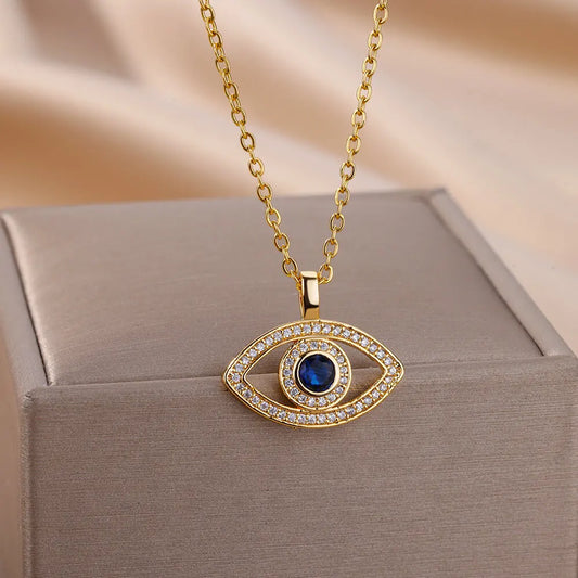 Collar con colgante de ojo malvado de circonita dorada para mujer
