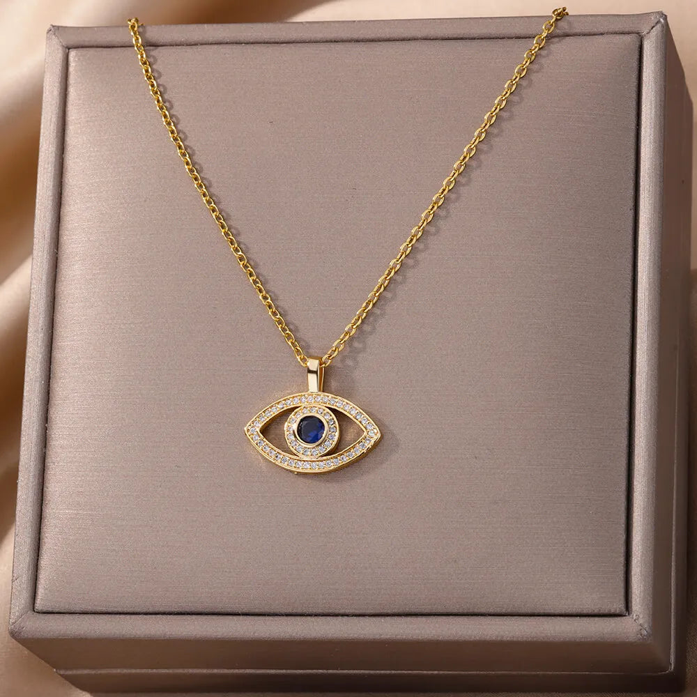 Collar con colgante de ojo malvado de circonita dorada para mujer