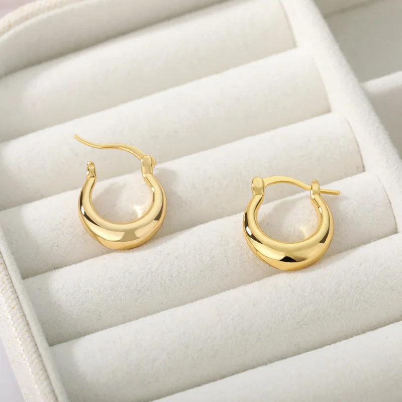 Pendientes minimalistas redondos de acero inoxidable para mujer