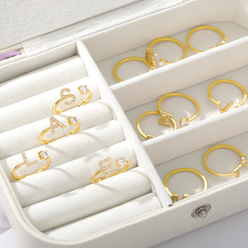 Anillo ajustable de acero inoxidable con baño 18k con hermosas circonias con letras unisex