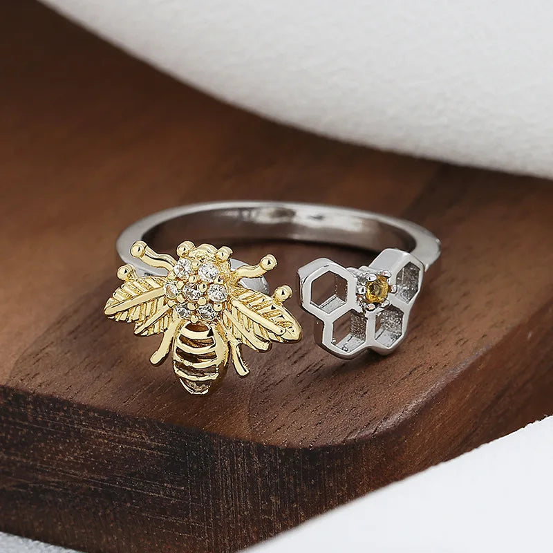 Anillo Fidget Spinner con forma de panal de abeja para aliviar la ansiedad