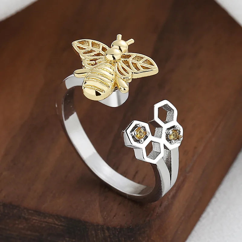 Anillo Fidget Spinner con forma de panal de abeja para aliviar la ansiedad