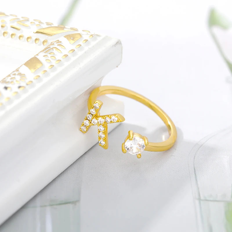 Anillo ajustable de acero inoxidable con baño 18k con hermosas circonias con letras unisex