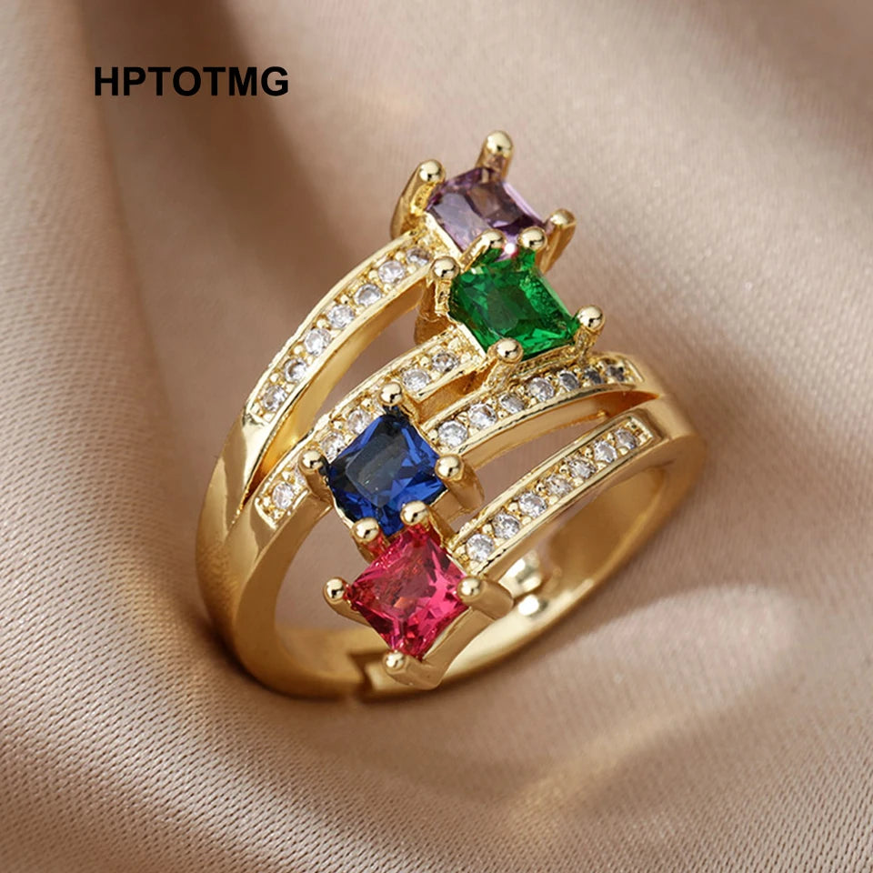 Anillo de acero inoxidable multicapa con circonitas de colores