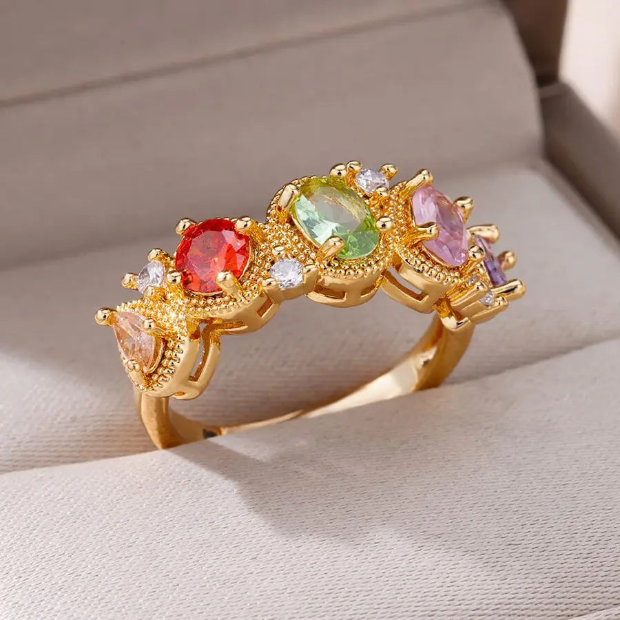 Anillo de acero inoxidable multicapa con circonitas de colores