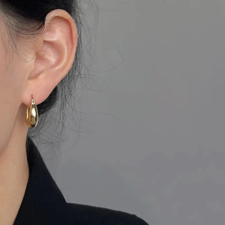 Pendientes minimalistas redondos de acero inoxidable para mujer